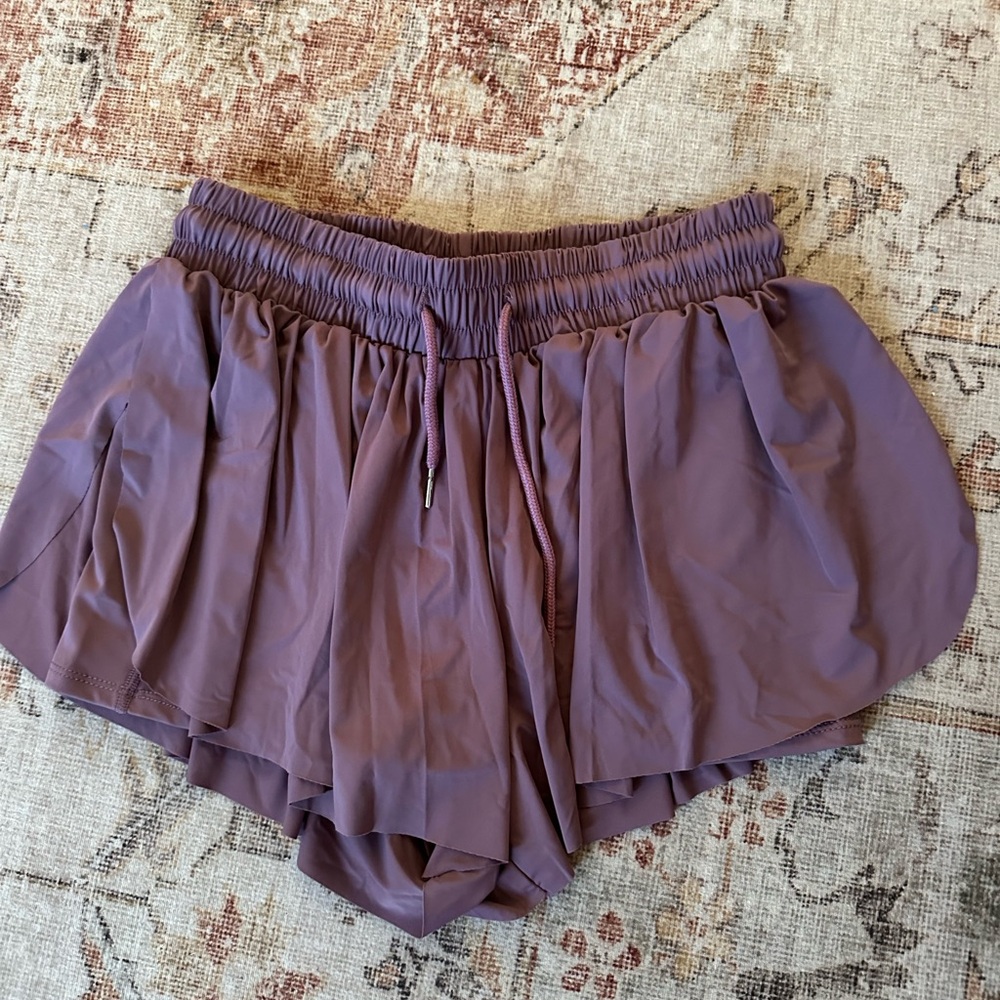 purple running shorts